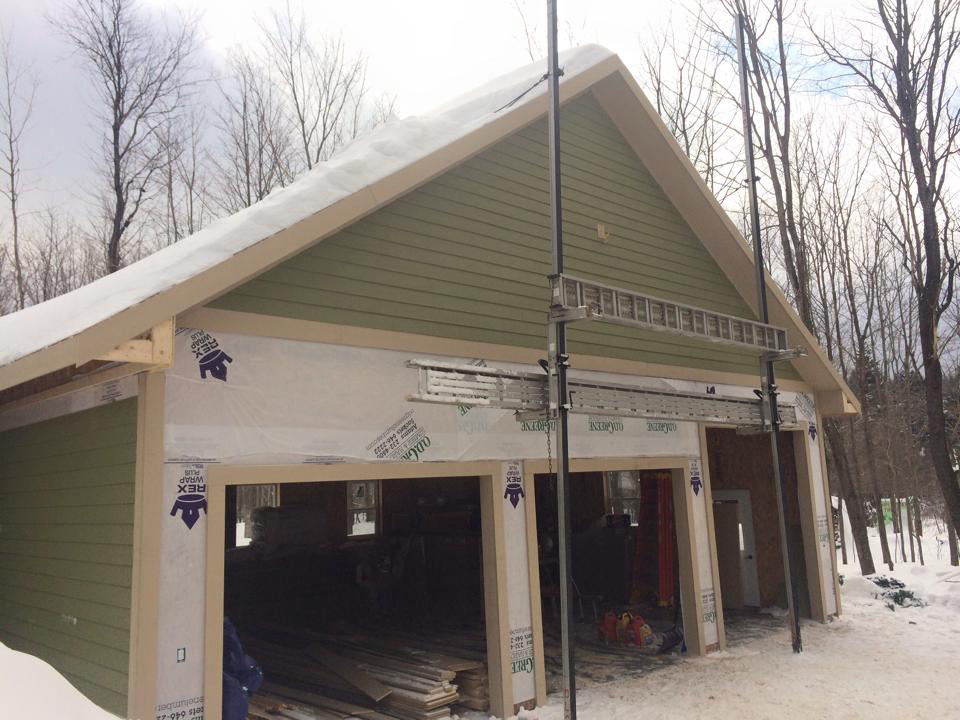 Nearly finished exterior of a structural panel garage in New York