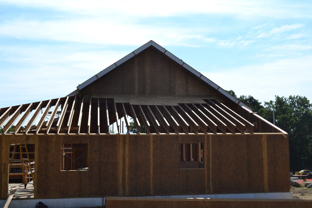 Stick framed roof over wall SIPs