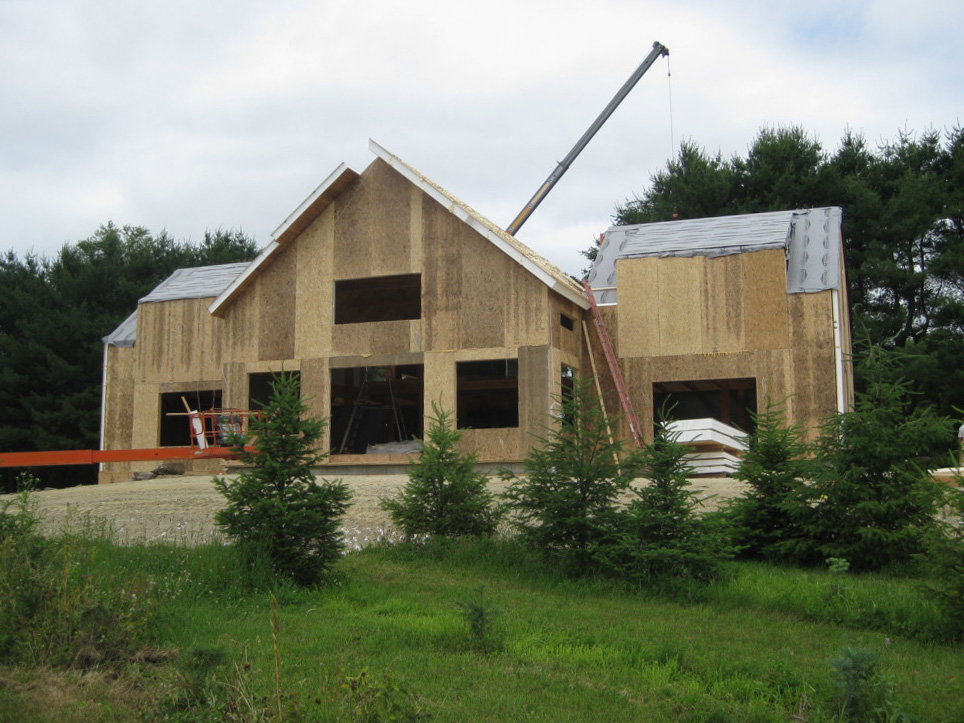 Timber frame structure SIPs installation