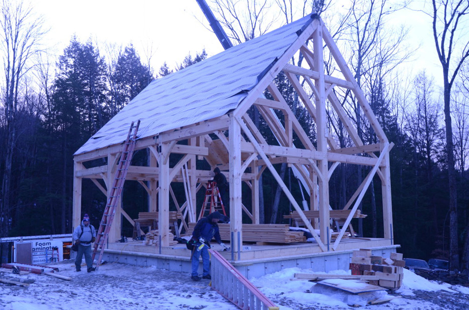Timber frame ready for SIPs installation in New Hampshire